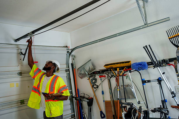 Professional Garage Door Panel Replacement technician working in Chimayo, NM